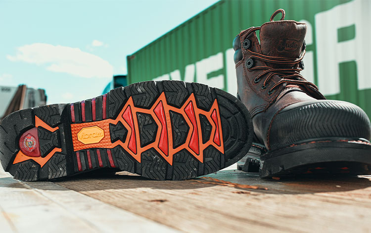 Justin Warhawk nano comp toe botas con cordones en marrón